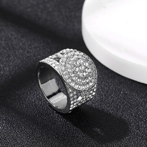 Macro shot of silver Cuban link ring featuring high-quality pavé-set white zircons