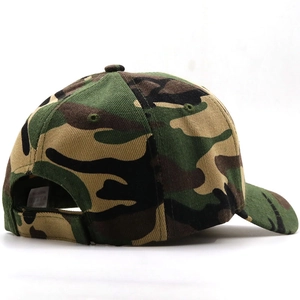 Detail of camouflage baseball cap showing adjustable velcro strap and canvas texture