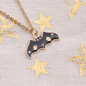 Halloween bat pendant necklace in gold finish with ghost and star motifs on fabric