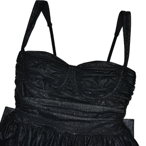 Detail of black ruched bodice featuring shimmering glitter fabric and delicate spaghetti straps