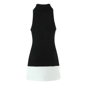 Women's sleeveless turtleneck knit dress featuring stylish black and white color block design