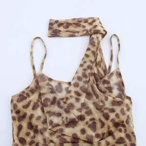 Sexy leopard print sheer mesh bodysuit with asymmetric ruffles and neck strap