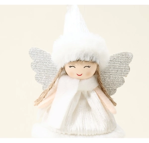 Detail of plush Christmas angel doll with white faux fur hat and silver glitter wings