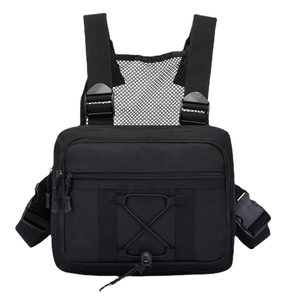 Tactical chest bag in black with adjustable straps and mesh back panel on white background