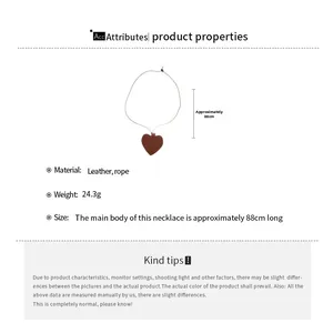 Detail view of brown heart leather pendant necklace showing 88cm length and material info
