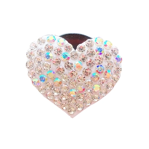 Sparkling crystal heart car vent clip air freshener with rhinestones on white background