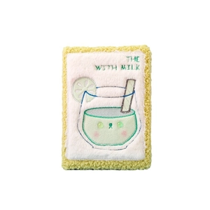 Cute yellow plush notebook cover with green drink embroidery and THE WITH MILK text