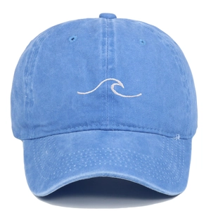 Vintage blue washed cotton baseball cap featuring minimalist white wave embroidery