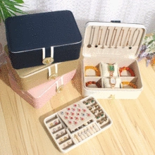 Detailed multi-layer jewelry organizer with necklace hooks and ring slots in four colors
