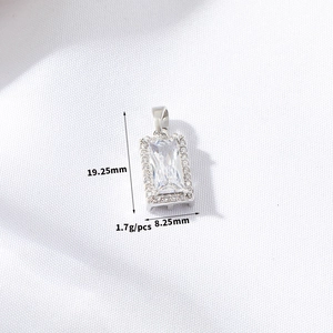Detailed view of square purple zircon pendant with size markings 19.25mm by 8.25mm