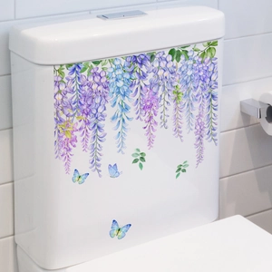 Detail of floral toilet decal with purple wisteria and butterflies on white ceramic