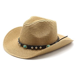 Detail of straw cowboy hat with brown leather band and turquoise stone accents