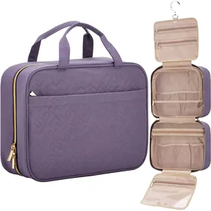 Waterproof purple toiletry bag featuring geometric quilting and internal hanging hook