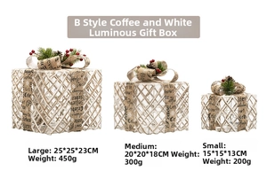 Three-piece glowing Christmas gift box set with pine cones and festive ribbon detail