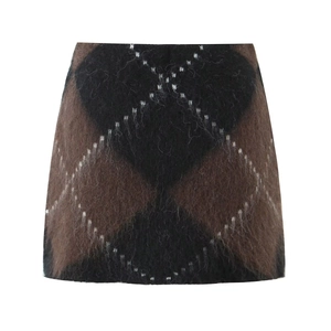Close-up of vintage brown plaid knit mini skirt with soft plush texture details