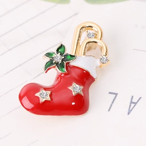 Elegant Christmas tree brooch with red enamel, gold plating and sparkling rhinestones