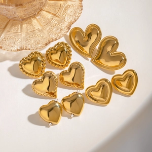 Chubby heart-shaped gold stainless steel earrings in various polished and twisted designs