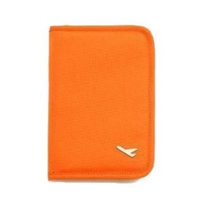 Orange nylon travel passport wallet with metal airplane icon on a plain white background