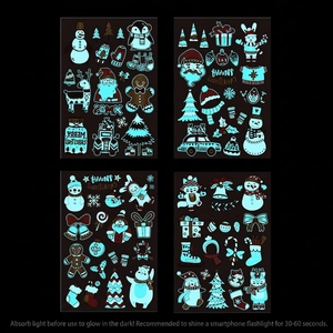 Luminous Christmas tattoo set showing snowman and Santa Claus glowing in the dark