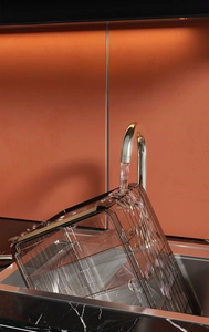 Washable transparent food cover showing easy cleaning process under running water