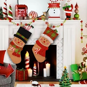 Gingerbread man Christmas stockings hanging on a fireplace for festive holiday decoration