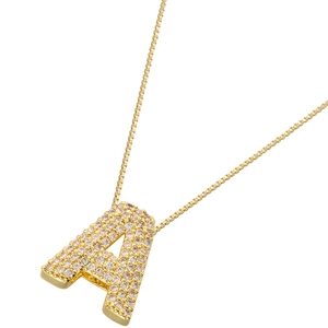 Macro shot of gold-plated letter A pendant necklace encrusted with shimmering cubic zirconia