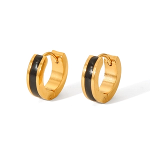 Detail of 18K gold plated stainless steel hoop earrings with black enamel inlay