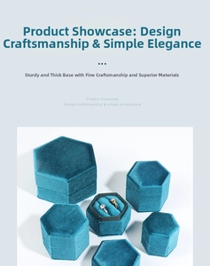 Detailed view of hexagonal teal velvet jewelry boxes with dual slots for engagement rings