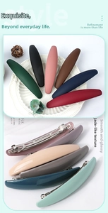 Detail of matte and glossy minimalist spring hair clips in various elegant colors