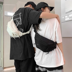 Street style nylon crossbody chest bag for men and women in classic black and white