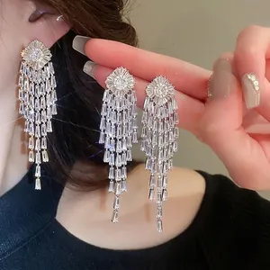 Silver tassels long drop earrings with cubic zirconia stones and sunflower stud design
