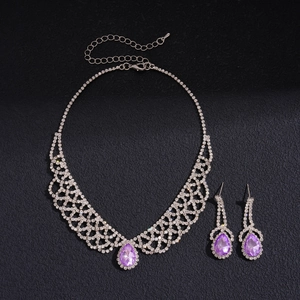 Detailed view of luxury purple teardrop rhinestone necklace and earring set