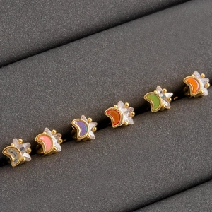 Set of six gold-plated star and moon stud earrings with colorful enamel and clear zircons