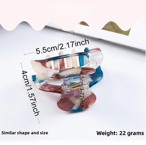 Dimensions détaillées de la pince à cheveux marbrée 5,5cm, indiquant taille et poids 22g