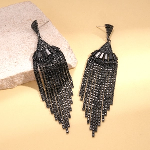 Close-up of black zircon fan-shaped tassel earrings with detailed silver needles