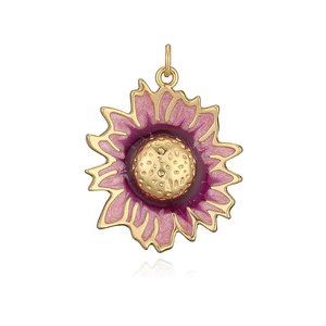 Macro view of sunflower pendant with pink purple enamel and golden texture detail
