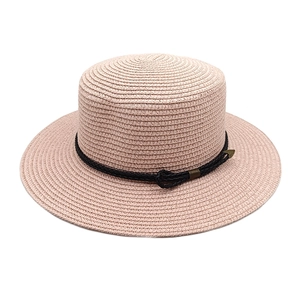 Detailed top view of a wide-brim straw sun hat with black woven cord and metal buckle