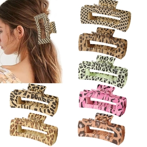 Large 10.5cm hair claw clips in trendy leopard and zebra prints for various hairstyles