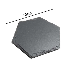 Detail of 10cm hexagonal natural slate coaster with dark grey stone texture