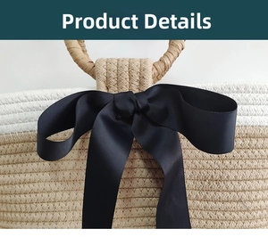 Close-up of dual-tone woven tote bag featuring a large black ribbed ribbon bow detail