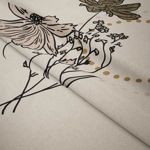 Detail of bohemian wall tapestry showing beige cotton texture and floral pattern
