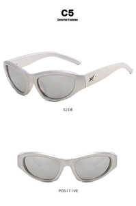 Detail view of silver Y2K sunglasses featuring star-shaped metal accents on the frame