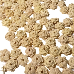 Wholesale boxwood lotus flower beads for DIY jewelry making in cream white finish