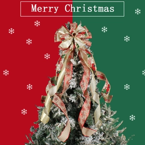 Red and gold Christmas tree topper bow with snowflake pattern and red truck design