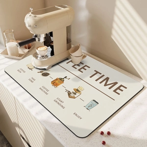 Absorbent coffee machine mat with vintage brown illustrations on cream rubber surface