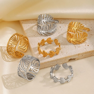 Adjustable leaf-shaped stainless steel rings in gold and silver finish for women