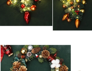 Detail of Christmas wreath with pine cones, red gold ornaments and warm LED light