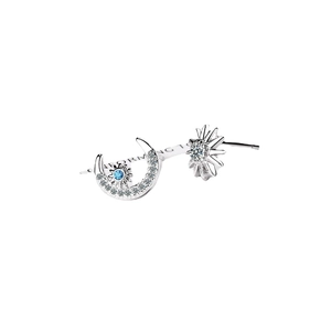 Asymmetric moon and sun stud earrings with blue gems and cubic zirconia in silver finish