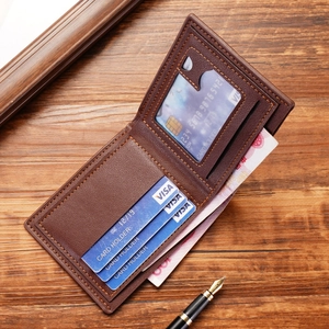 Men's dark brown leather wallet with multi-card slots shown open on a wooden desk