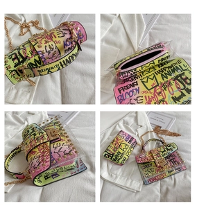 Detail of transparent graffiti jelly bag set with gold chain strap and inner pouch